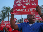 Shardrick Ridley, 49-year-old nurse, participates in a protest advocating for increased investment in the VA healthcare system, opposing job freezes and cuts that jeopardize veterans&iacute; access to medical care.