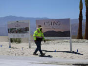 Construction is progressing at Cotino, a Disney housing project with 1,932 planned homes spread across more than 600 acres in the desert city. (Allen J.