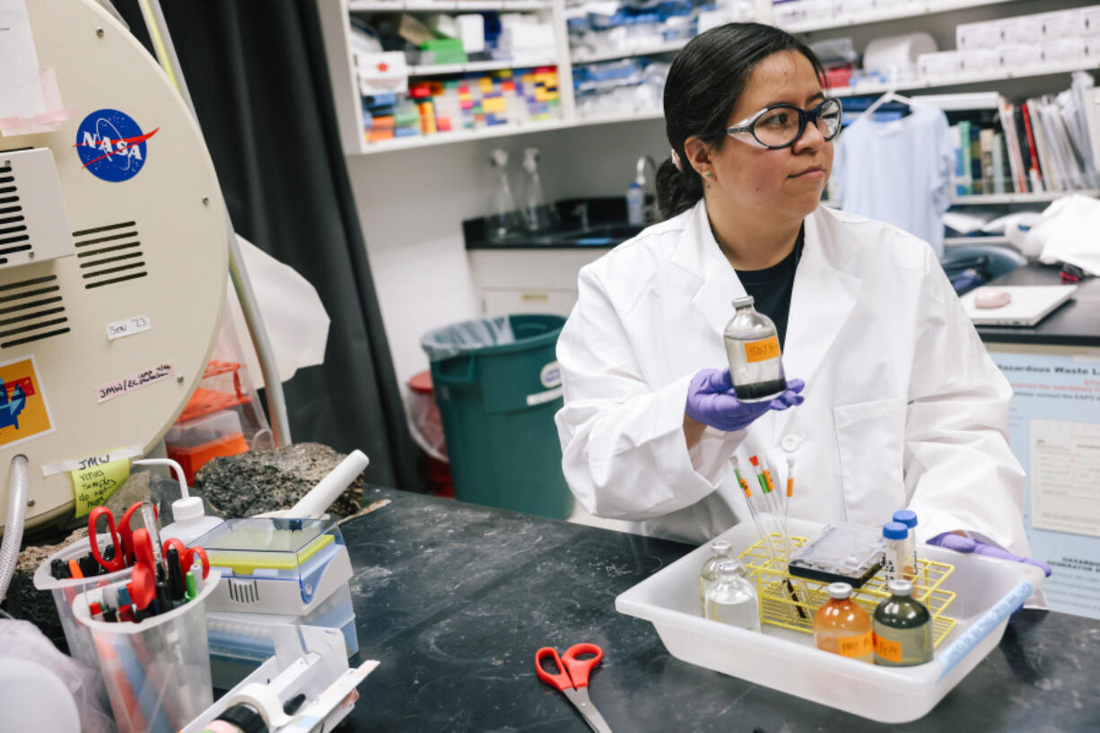 Cathy Trejo at work inside the Origins and Habitability Lab for experiments at Jet Propulsion Laboratory on May 29, 2024, in Pasadena, California. She is one of several students from California State University, Los Angeles who are interning at the lab through a grant that helps underrepresented students learn more about astrobiology and perform NASA-sponsored research.