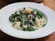 You won&rsquo;t miss the wheat in this gluten-free gnocchi tossed with spinach and peas in a lemony cream sauce.