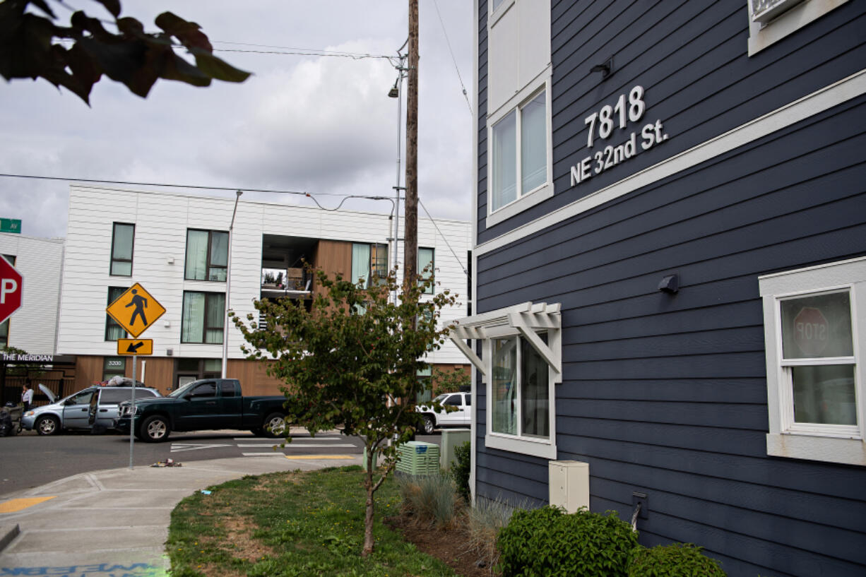 The Meridian apartment complex, left, is pictured across the street from The Pacific in central Vancouver.