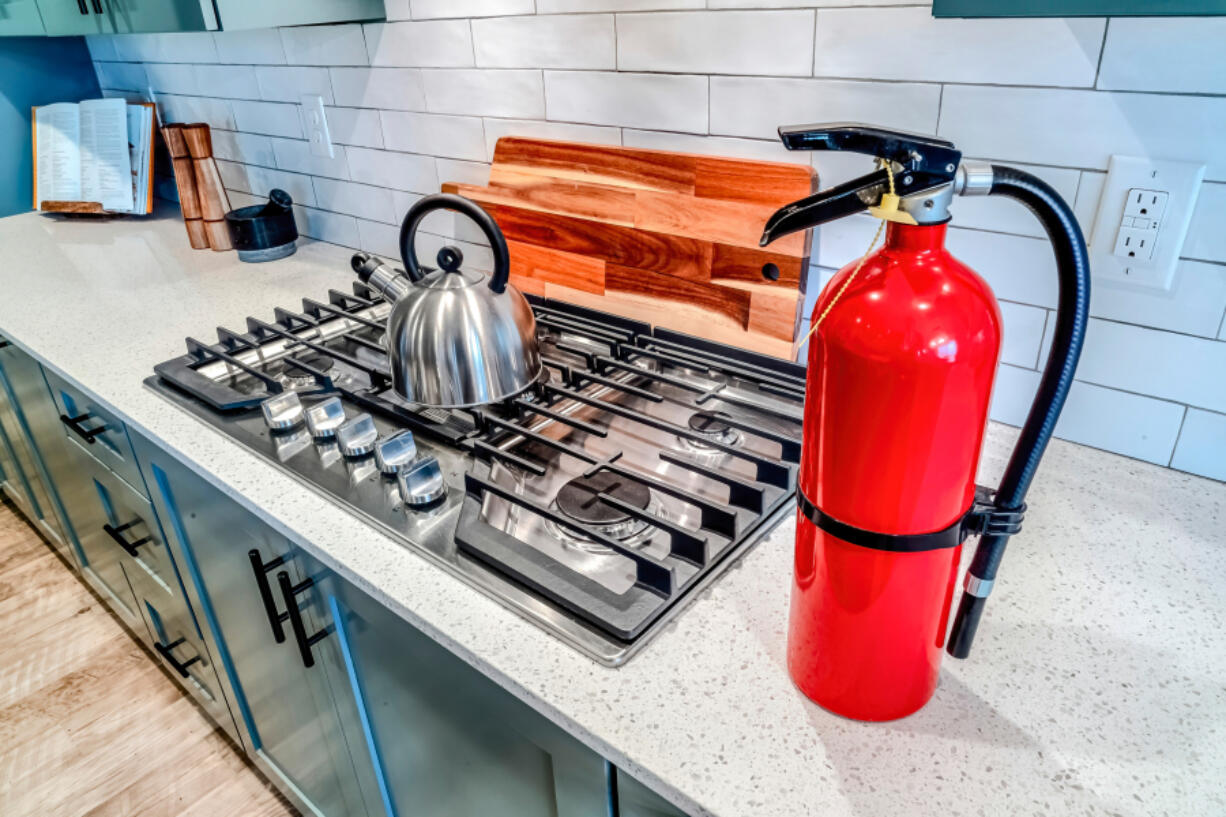 Fire extinguishers are a vital part of home ownership, and one should always be kept in the kitchen.