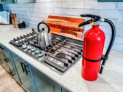 Fire extinguishers are a vital part of home ownership, and one should always be kept in the kitchen.