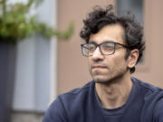 Rabi Asghar poses for a portrait outside of his home on Tuesday, Sept. 3, 2024, in Seattle.