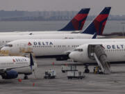 A Washington state woman is permanently scarred after flying with Delta Air Lines, according to a new federal lawsuit that says a flight attendant served her dangerously hot coffee that spilled onto her, leaving her with first- and second-degree burns.