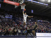 Gonzaga guard Rasir Bolton goes up for a dunk during the first half of a college basketball game against Eastern Oregon, Wednesday, Dec. 28, 2022, in Spokane, Wash.