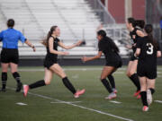 Washougal's Maite Urzua-Sanchez, center, celebrates with teammate Maddy Alldrin, left, after scoring a goal in a second half of a 2A Greater St. Helens League girls soccer game against Hockinson on Tuesday, Sept. 24, 2024, at Washougal High School.