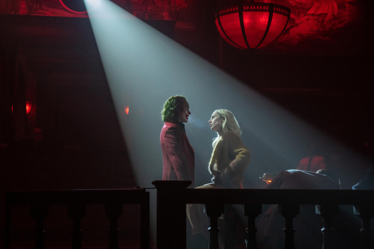 Joaquin Phoenix, left, and Lady Gaga in &ldquo;Joker: Folie a Deux.&rdquo; (Niko Tavernise/Warner Bros.)