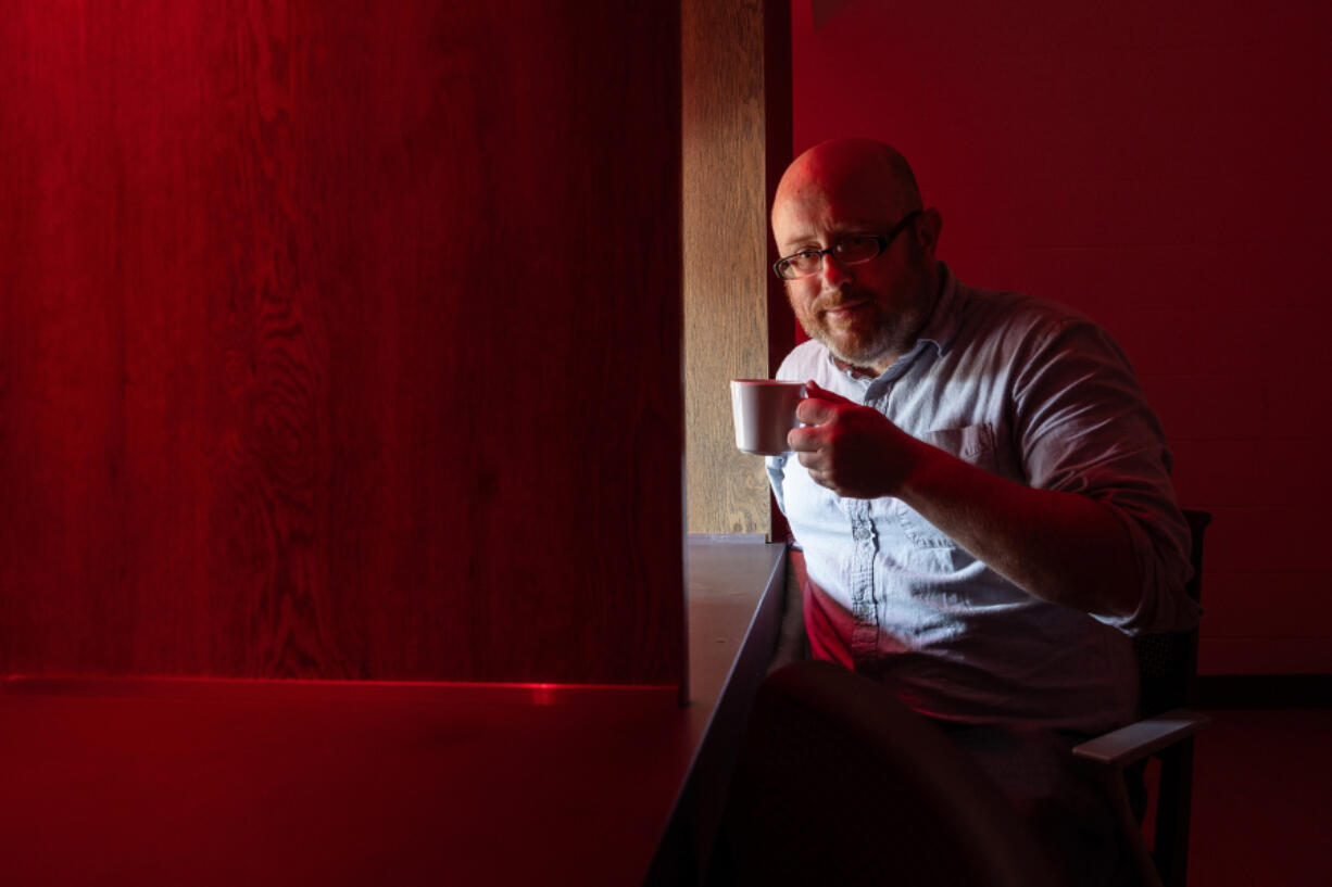 Bill Ristenpart, director of the University of California Davis&rsquo; new Coffee Center, pauses under the red lights of the facility&rsquo;s sensory booth July 24 in Davis, Calif.