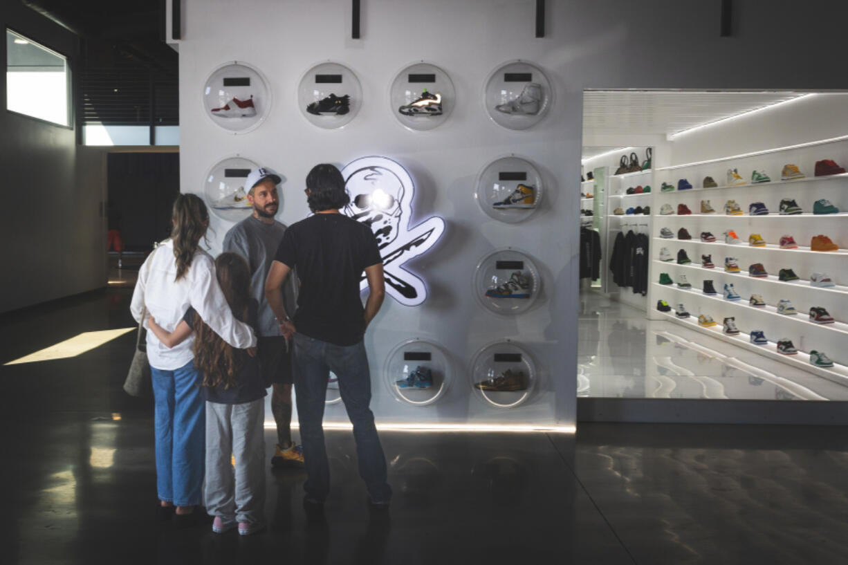 Dominic Ciambrone, aka the Shoe Surgeon, show his guest around his headquarters design space/playhouse on Aug. 28, 2024, in Los Angeles.