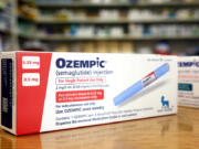 Boxes of the diabetes drug Ozempic rest on a pharmacy counter on April 17, 2023, in Los Angeles.