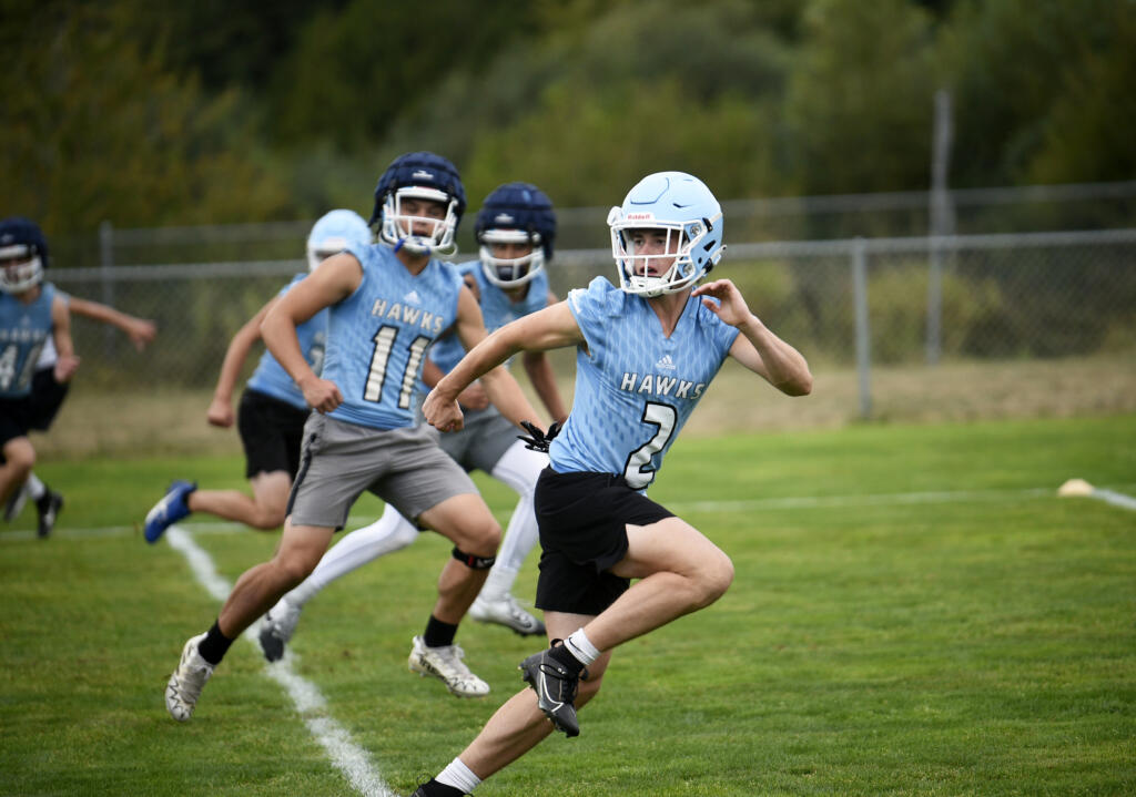 Senior Madsen Richardson (2) goes through drills during a preseason practice at Hockinson High School on Thursday, Aug. 22, 2024.