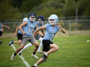 Senior Madsen Richardson (2) goes through drills during a preseason practice at Hockinson High School on Thursday, Aug. 22, 2024.