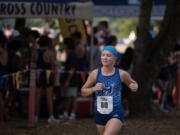 Hockinson's Lyla Taylor keeps the pace while on her way to taking first place in the girls varsity race during the 63rd annual Steve Maas Run-a-Ree cross country race at Hudsons Bay High School on Friday evening, Sept. 6, 2024.