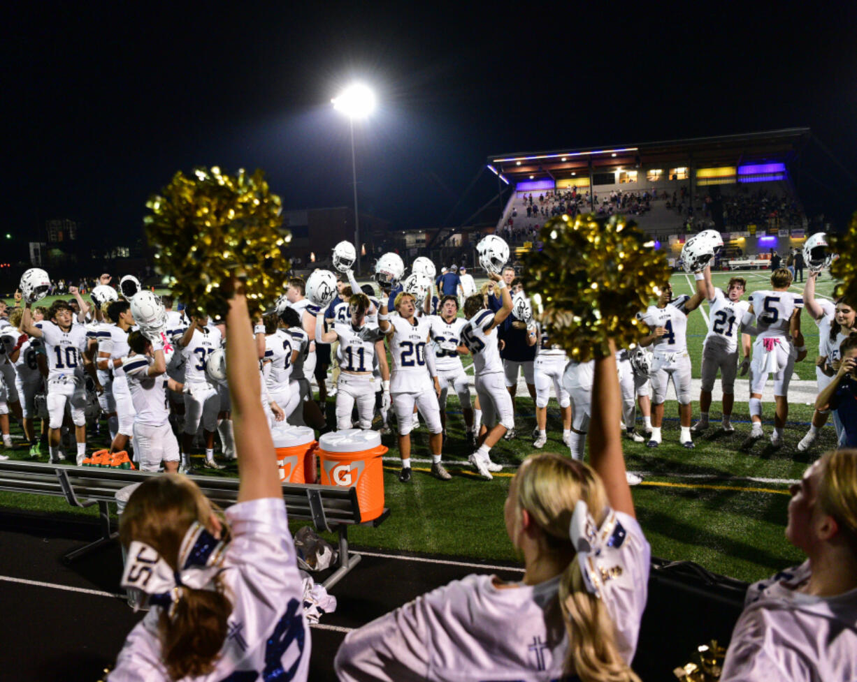 Seton Catholic players sing the school fight song with cheerleaders and fans Friday, Sept. 6, 2024, following Seton&Ccedil;&fnof;&Ugrave;s 56-7 win against Columbia River at Columbia River High School.