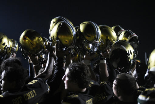 Evergreen players celebrate their 18-0 win over Union in a non-league football game at McKenzie Stadium on Friday, Sept. 6, 2024.