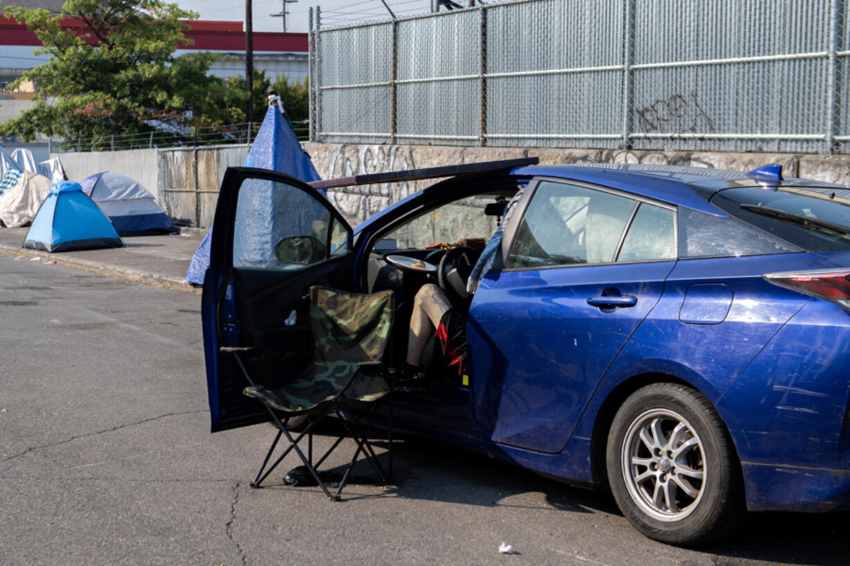 A car parked at a homeless encampment in downtown Vancouver on Thursday morning.