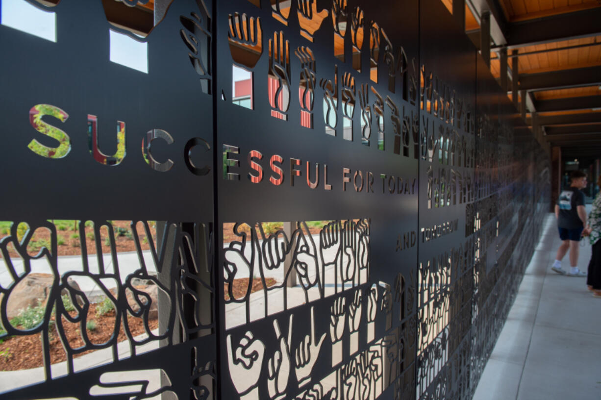 A new wall at the Washington School for the Deaf&rsquo;s main entrance features messages of core school values, like belonging, in American Sign Language. This week, the school welcomed students to a state-of-the-art new campus that school leaders hope will instill a sense of pride in its students.