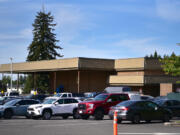 Cars sit in a parking lot Tuesday at the former Image Elementary in east Vancouver. SEH America purchased the former school property at the end of August. Plans are for Southwest Washington's regional law enforcement training academy to continue operating there.