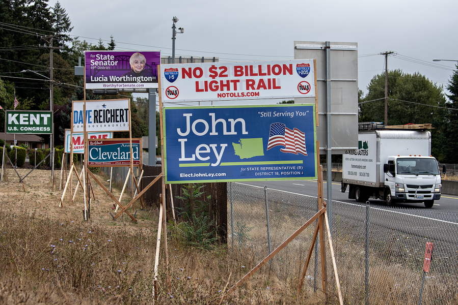 Political campaign signs are seen along state Highway 14 on Thursday morning. Legislative candidates in Clark County are reporting rampant vandalism and theft of campaign signs. &ldquo;This issue is much worse than what I experienced during my last campaign in 2022,&rdquo; said 17th Legislative District House Position 2 candidate Terri Niles, a Democrat.