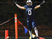 Skyview senior Rex Allinger celebrates a touchdown Friday during the Storm&rsquo;s 21-17 comeback win against Graham-Kapowsin.