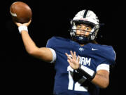 Skyview senior quarterback Doogie Poindexter throws the ball Friday, Sept. 13, 2024, during the Storm’s 21-17 comeback win against Graham-Kapowsin at Kiggins Bowl.