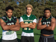 Evergreen seniors Makhi Miller, from left, Josiah Alanis and Mark Williams pose for a portrait Monday, Sept. 16, 2024, at Evergreen High School.