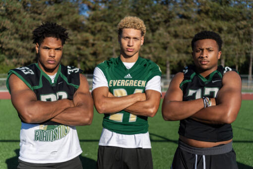 Evergreen seniors Makhi Miller, from left, Josiah Alanis and Mark Williams pose for a portrait Monday, Sept. 16, 2024, at Evergreen High School.