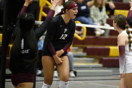 Prairie&#039;s Gracie Jacoby (12) celebrates a point during a volleyball match against Skyview on Thursday, Sept. 12, 2024 at Prairie High School.