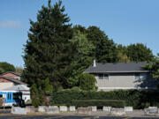 A driver passes by apartments at 2909 N.E. 57th Ave., Vancouver. International Air and Hospitality Academy currently uses the building to house its students. However, the building will soon be mixed-income housing.