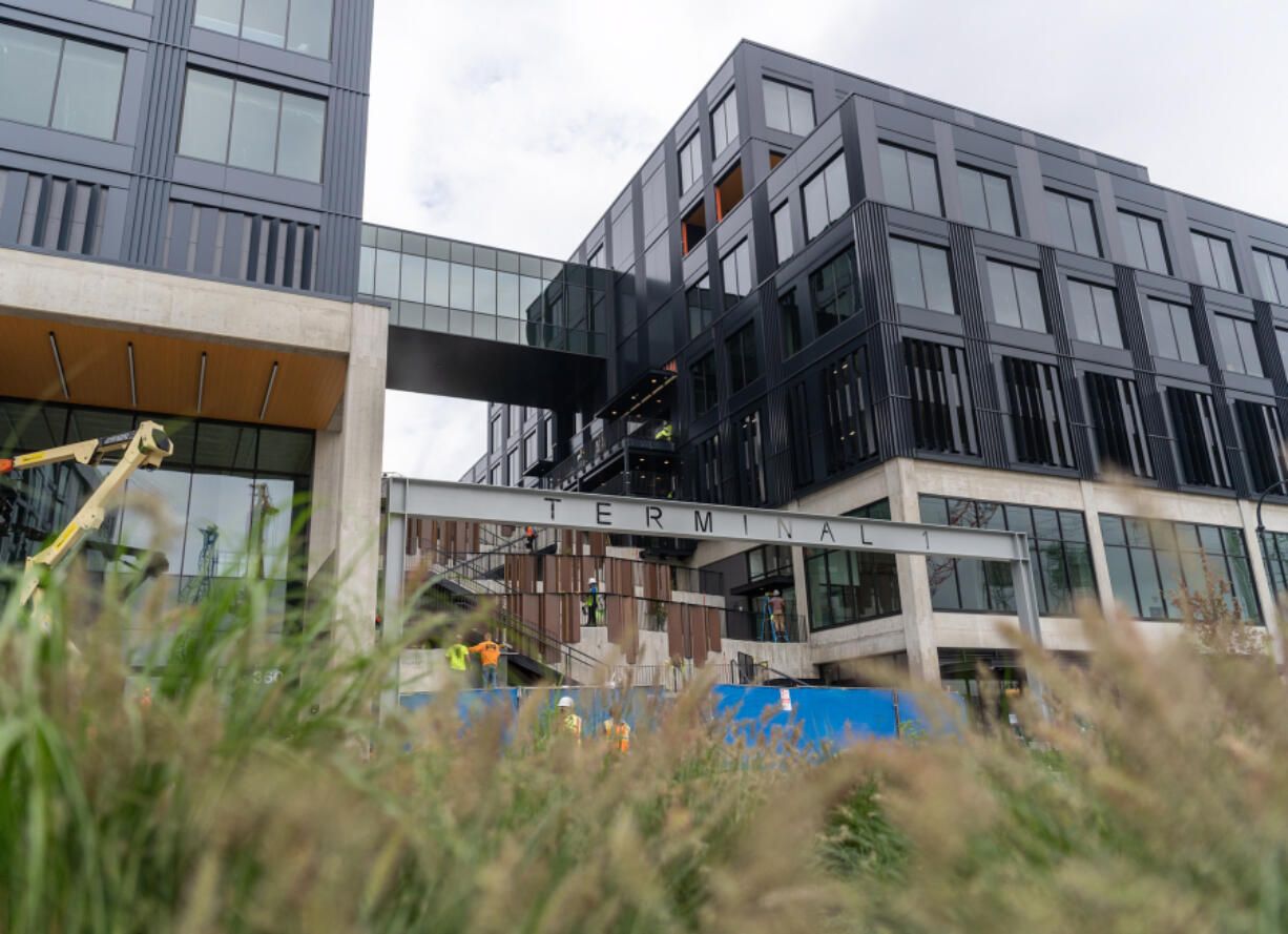 Construction continues on the Terminal 1 building on West Columbia Way. The building is the future home of Vancouver company ZoomInfo, which is facing a class-action securities lawsuit.