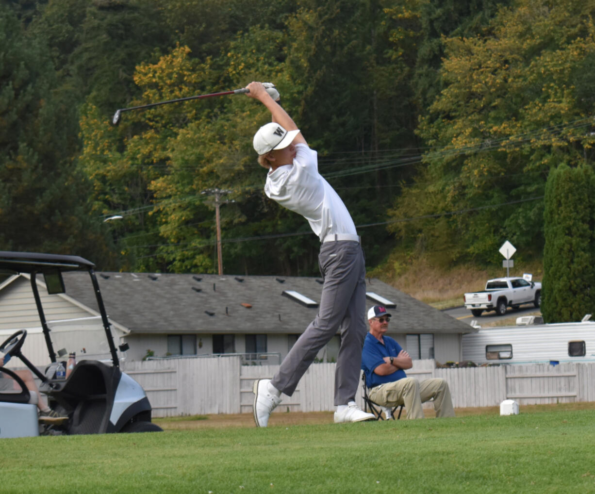 Mason Acker of Washougal tees off on the No. 5 hole at Mint Valley Golf Course in Longview during a match against Mark Morris on Tuesday, Sept. 10, 2024.