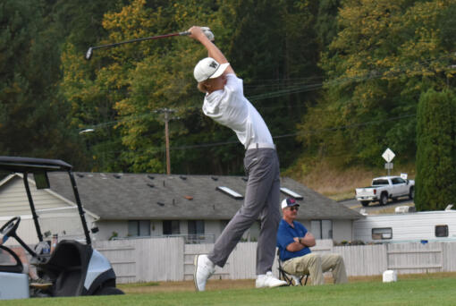 Mason Acker of Washougal tees off on the No. 5 hole at Mint Valley Golf Course in Longview during a match against Mark Morris on Tuesday, Sept. 10, 2024.