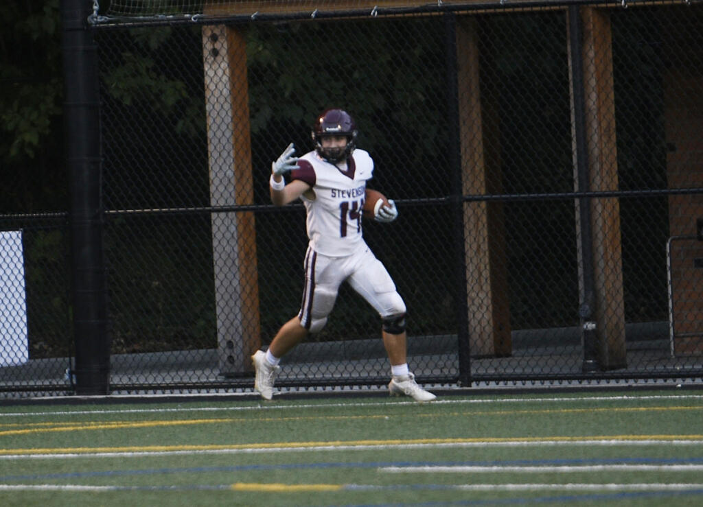 Derek White of Stevenson signals to his teammates after scoring his fourth touchdown against Fort Vancouver in a 1A Trico League football game at Kiggins Bowl on Friday, Sept. 20, 2024.