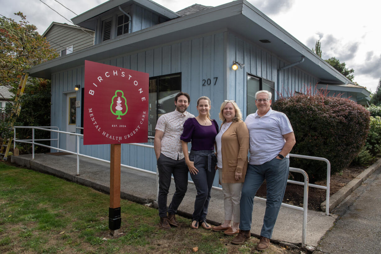 Therapists Brandon Fielding, from left, and his wife, Kelli Dougal, join fellow therapist Gayle Fielding and her husband, clinical psychologist Kelly Fielding, at Birchstone on Friday afternoon. Birchstone is a family-owned mental health clinic in Vancouver.