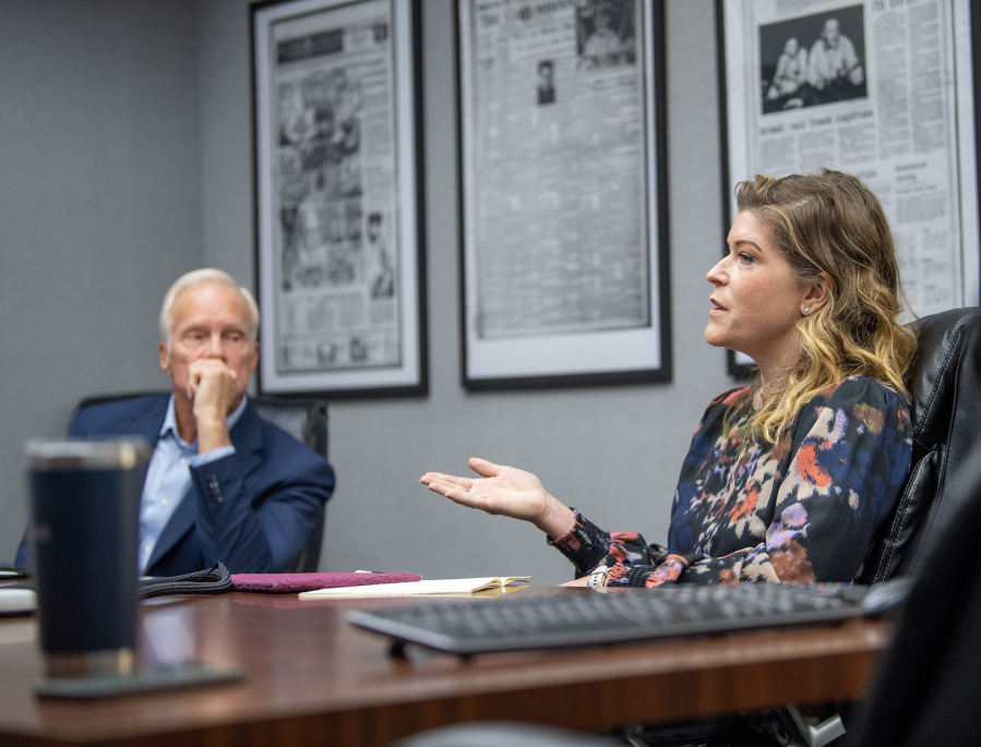 Rep. Paul Harris, R-Vancouver, left, listens as White Salmon Mayor Marla Keethler answers a question Tuesday during an editorial board meeting at The Columbian. The two are vying for the 17th Legislative District Senate seat.