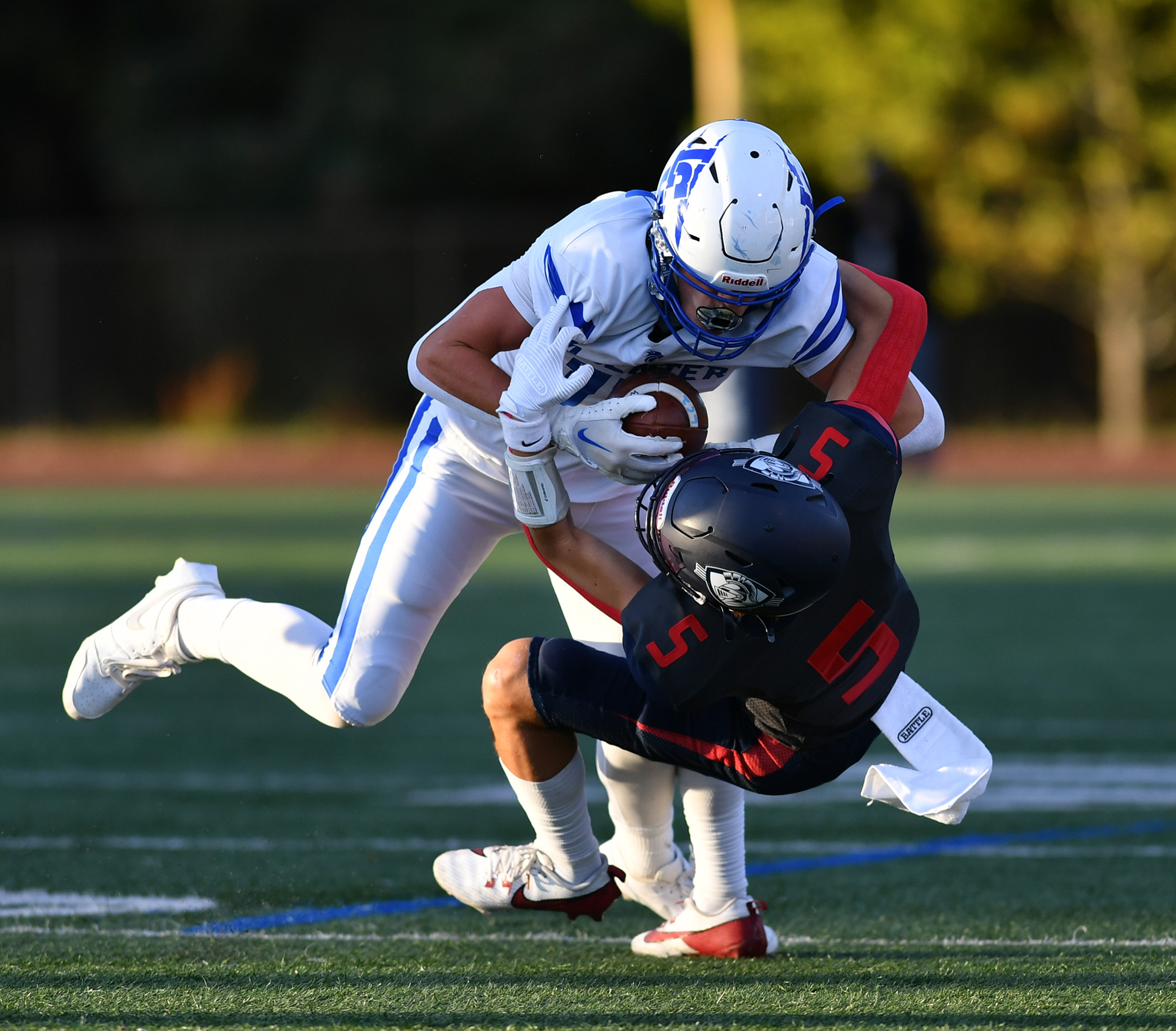 King’s Way senior Radley Matson-Blighton (5) tackles La Center senior Parker McKinney on Friday, Sept. 27, 2024, during La Center’s 34-0 win against King’s Way at King’s Way Christian School.