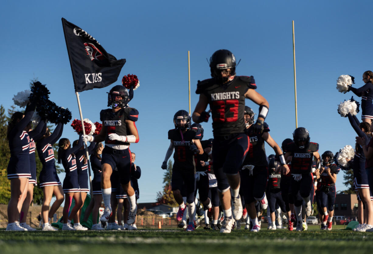 The King&rsquo;s Way Christian Knights take the field Friday before a Trico League football game against La Center at King&rsquo;s Way Christian School.