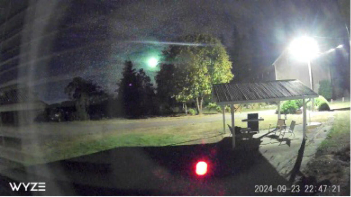 Late Monday night, a security camera near Cornelius, Ore., captured this image of a fireball descending.