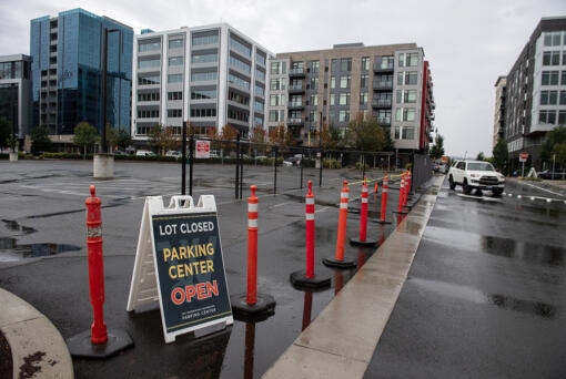 A sign notifies drivers that a surface parking lot near the new parking garage is closed at the Waterfront Vancouver. Some are having difficulty adjusting to the new parking garage and parking situation at the waterfront.