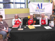 Assistance League Southwest Washington member volunteers recently went shopping at Fred Meyer for back-to-school clothing with 99 local youths living in out-of-home care.