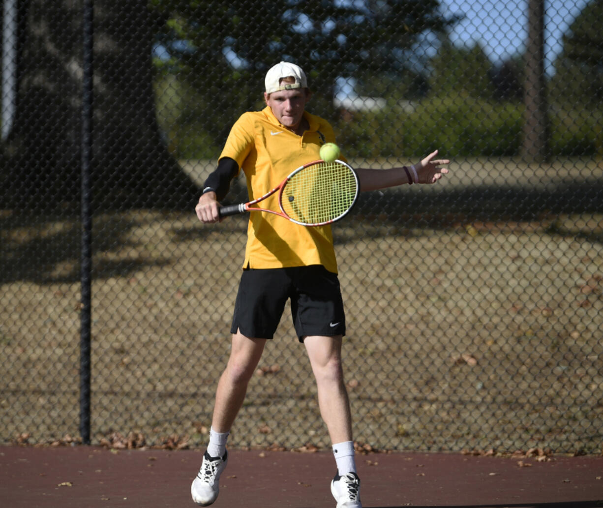 Tanner Koford of Hudson&#039;s Bay returns a shot during a match against Columbia River at Hudson&#039;s Bay High School on Monday, Sept. 23, 2024.