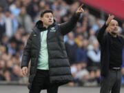 Mauricio Pochettino, left, was hired Tuesday, Sept. 10, 2024, to succeed Gregg Berhalter as U.S. men’s national team coach.