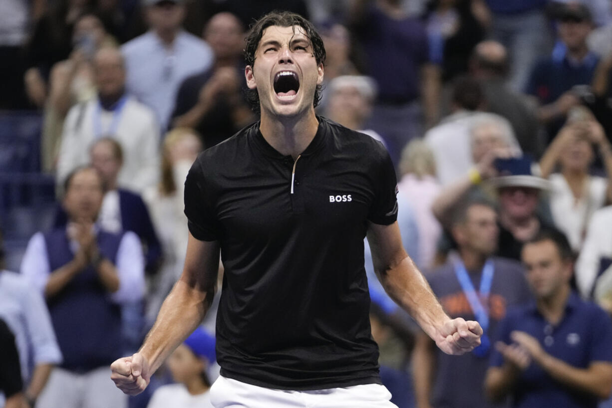 Taylor Fritz, of the United States, reacts after defeating Frances Tiafoe, of the United States, during the men's singles semifinal of the U.S. Open tennis championships, Friday, Sept. 6, 2024, in New York.