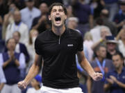 Taylor Fritz, of the United States, reacts after defeating Frances Tiafoe, of the United States, during the men's singles semifinal of the U.S. Open tennis championships, Friday, Sept. 6, 2024, in New York.