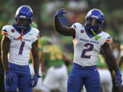 Boise State running backs Jambres Dubar (1) and Jeanty (2) dance during warmups before an NCAA college football game against Oregon, Saturday, Sept. 7, 2024, at Autzen Stadium in Eugene, Ore.