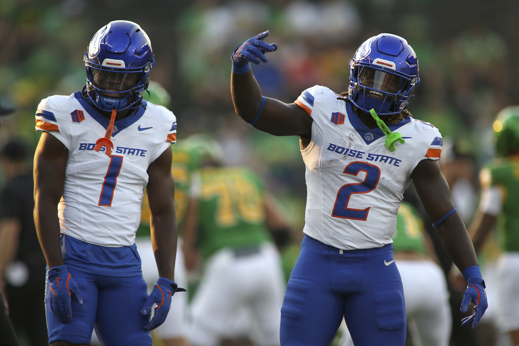 Boise State running backs Jambres Dubar (1) and Jeanty (2) dance during warmups before an NCAA college football game against Oregon, Saturday, Sept. 7, 2024, at Autzen Stadium in Eugene, Ore.