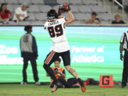 Oregon State tight end Bryce Caufield (89) catches the ball for a touchdown against San Diego State during the second half of an NCAA college football game Saturday, Sept. 7, 2024, in San Diego.