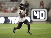 Oregon State running back Jam Griffin (8) runs with the ball during an NCAA football game against San Diego State on Saturday, Sept. 7, 2024, in San Diego.