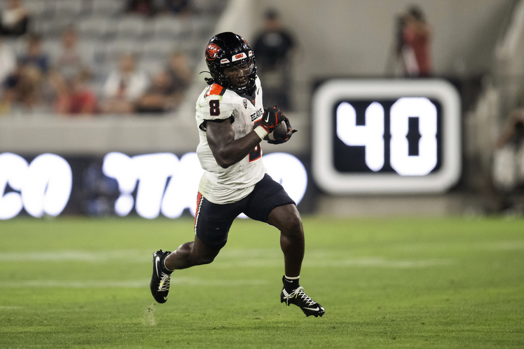 Oregon State running back Jam Griffin (8) runs with the ball during an NCAA football game against San Diego State on Saturday, Sept. 7, 2024, in San Diego.